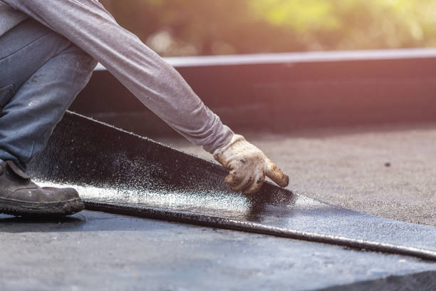 Professional Basement Waterproofing technician working in Utica, IN